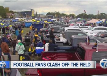 Football fans clash before the big game in Ann Arbor