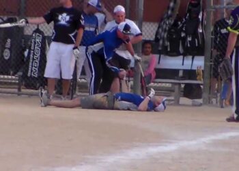 Marks 1 Collision's Nick Lollio slips and falls after scoring in Canton Strawberry Fest