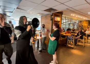 Pro-Palestine Protesters Enter Starbucks in Ann Arbor, Michigan
