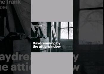 Daydreaming by the attic window | Anne Frank House | Secret Annex