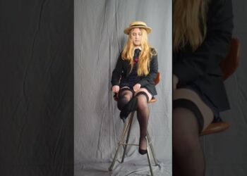 Annice Clarke Adjusts thigh highs