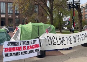 Protesters erect tents, banners on campus of University of Michigan