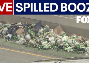 Live: Truck crash spills bottles of wine on I-94
