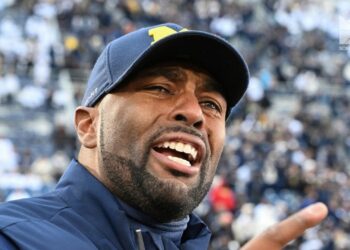 Fired Michigan coach jailed as police investigate situation that led to his arrest